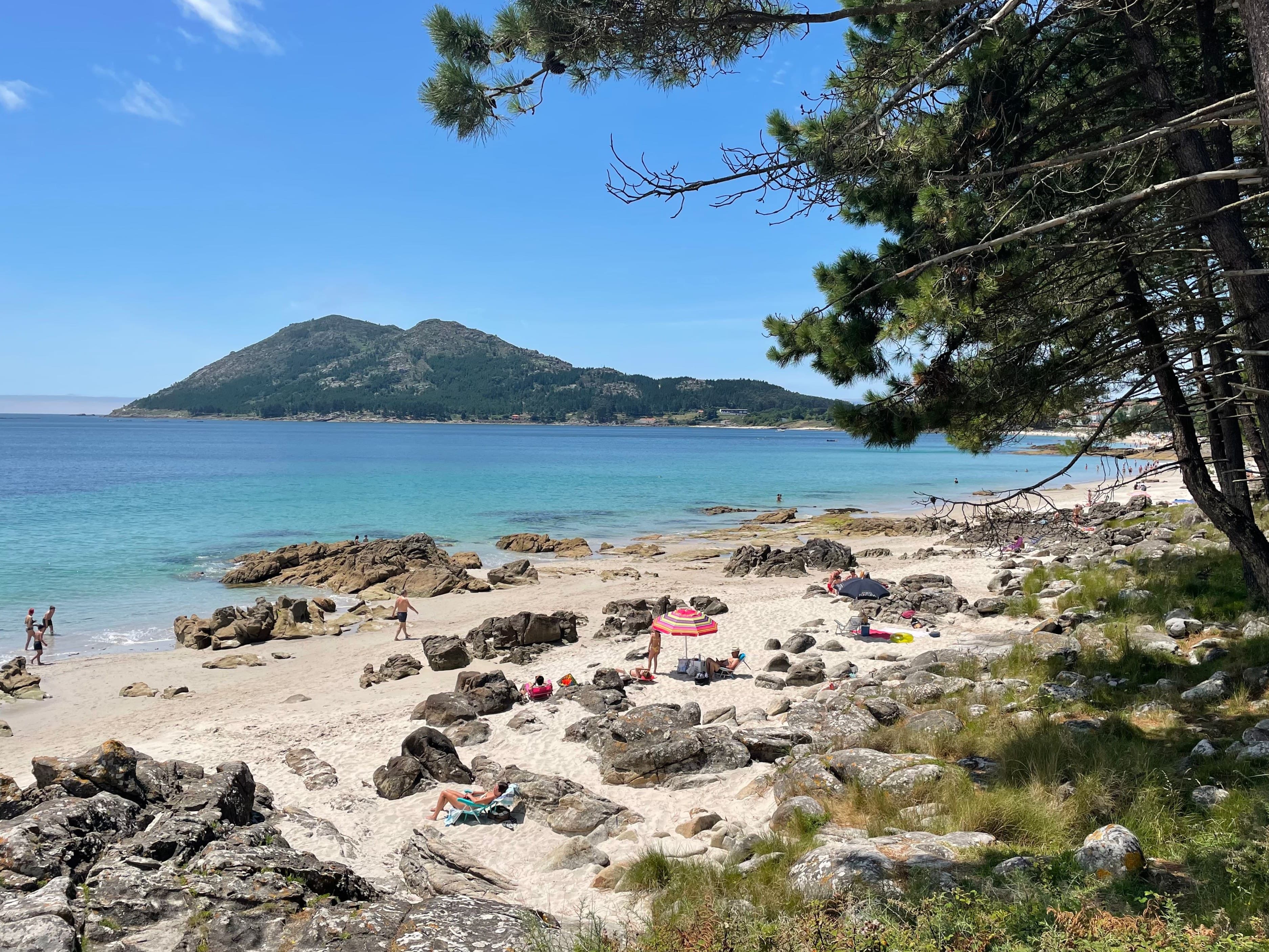 Turquoise Atlantic water and granite rocks at Praia de Area Maior near Muros